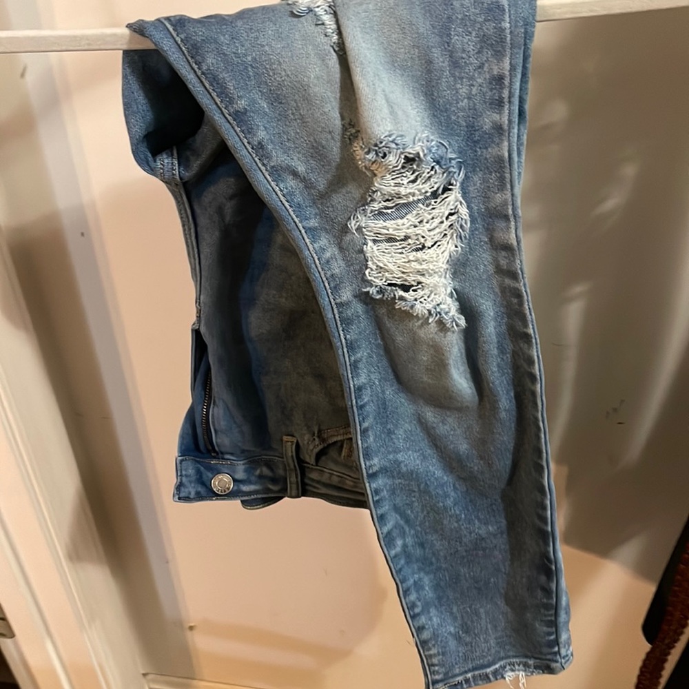 Never worn distressed skinny jeans.